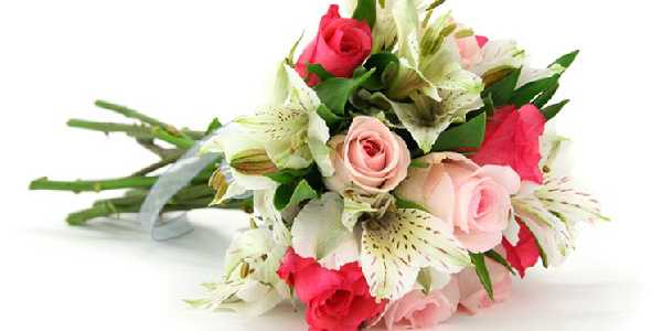 A Beautiful Vase Filled with Flowers on top of the table